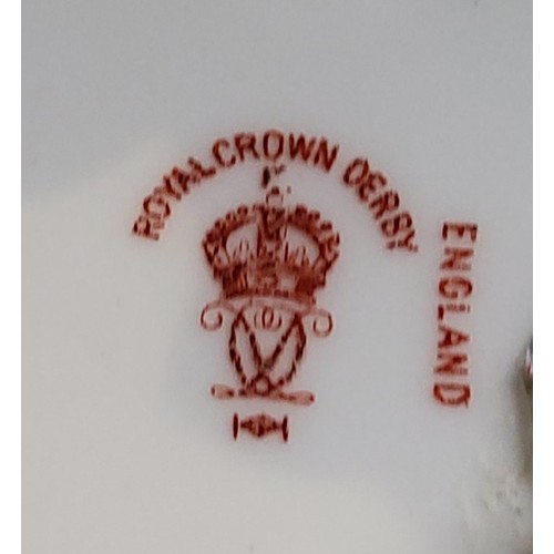 65 - A fine Royal Crown Derby wavy edge plate,&nbsp; painted by Cuthbert Gresley, with a large central bo... 