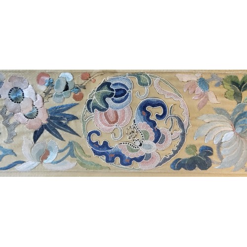 76 - Textiles - a Japanese silk kimono sleeve section, hand embroidered with mons, peonies, other flowers... 