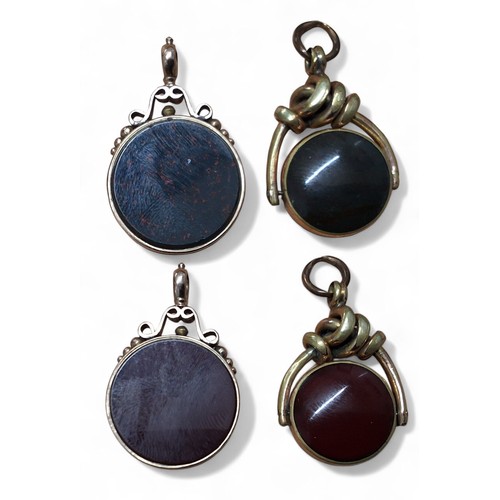 220 - A 9ct gold mounted double sided circular fob set with a bloodstone and carnelian, F.J.C., Birmingham... 