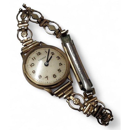 221 - A vintage Tissot lady&rsquo;s 9ct gold watch, Swiss 17 jewel movement, silver coloured dial, Arabic ... 