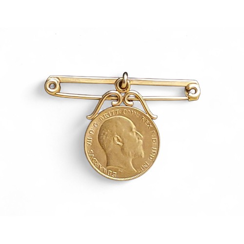 212 - A Edwardian half sovereign, 1903, soldered to 9ct bdrop bar brooch, 5.9g gross
