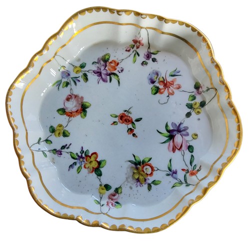 31 - A Bristol shaped circular stand, , decorated with festoons of flowers, in colours, gilt dentil borde... 