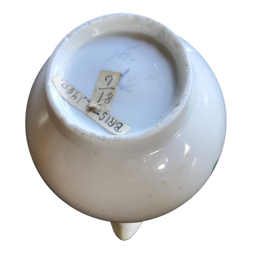 32 - A Bristol sparrow beak jug, decorated with a spray of colourful summer flowers, brown rim, 9.5cm hig... 