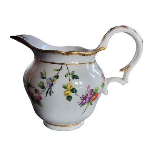 38 - A Bristol ogee milk jug, decorated with festoons of flowers, in colours, gilt dentil border, double ... 