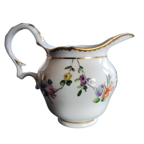 38 - A Bristol ogee milk jug, decorated with festoons of flowers, in colours, gilt dentil border, double ... 