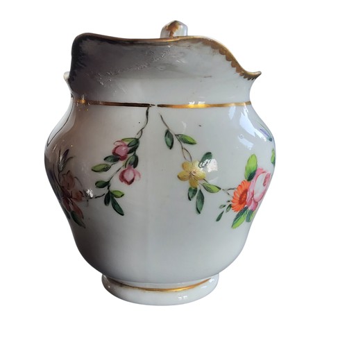 38 - A Bristol ogee milk jug, decorated with festoons of flowers, in colours, gilt dentil border, double ... 