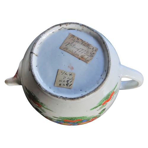 40 - A Plymouth teapot, brightly decorated wtih stylised flowers and foliage, associated Chinese cover, 1... 