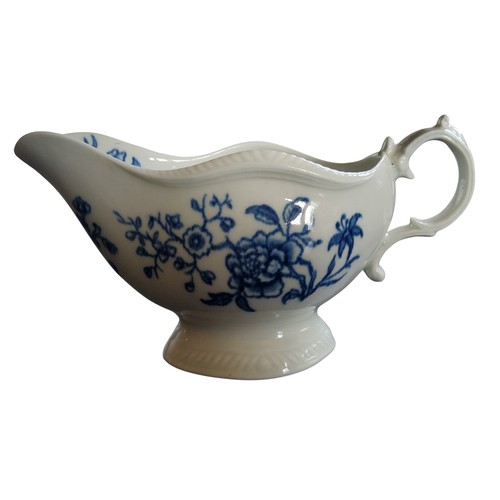 27 - A Worcester sauceboat, decorated with The Early Flowering Plant pattern, shaped gadrooned rim, scrol... 