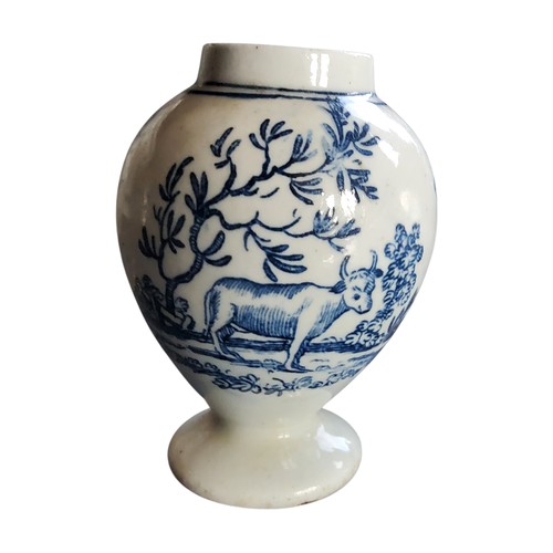 60 - A Liverpool ovoid tea canister, printed in underglaze blue with a milkmaid, companion&nbsp; and catt... 