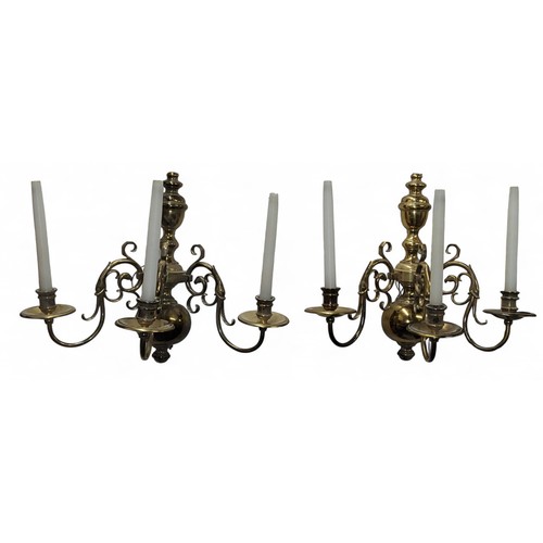 14 - A pair of brass three-light wall sconces, leafy scroll arms, globular back plates, 45cm highRemoved ... 