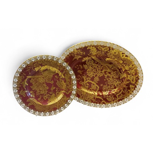 1 - A&nbsp; Royal Crown Derby Gold Aves pattern shaped oval serving plate, on a red ground, heraldic bor... 
