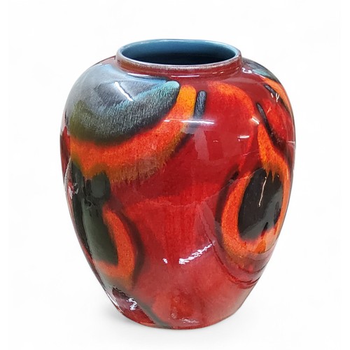 2 - A Poole Peacock pattern ovoid vase, in tones of red, blue and black, 22.5cm high, printed mark
