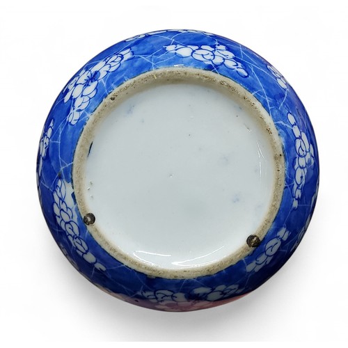 6 - A pair of Chinese bottle vases, painted in tones of underglaze blue with blossoming prunus on a&nbsp... 