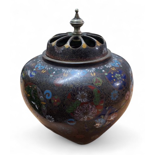10 - A Japanese ovoid cloisonne pot pourri vase, pierced cover, inlaid in colours and gilt with mons, flo... 