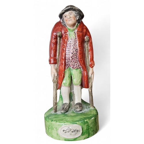 19 - A Staffordshire Pearlware figure, Old Age, modelled with an elderly gentleman, with&nbsp; crutches, ... 