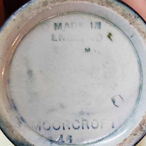 16 - A Moorcroft Pomegranate pattern baluster vase, tube lined with fruit and berries, in tones of red, p... 