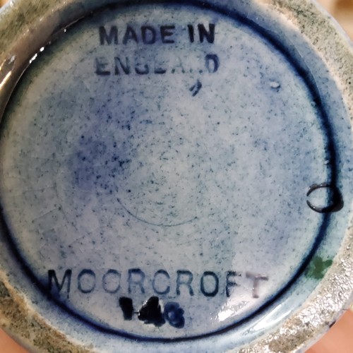 17 - A Moorcroft Pomegranate pattern baluster vase, tube lined with fruit and berries, in tones of red, p... 