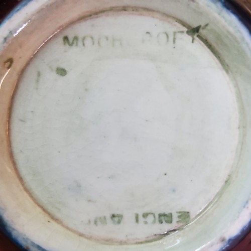 18 - A Moorcroft Pomegranate pattern bottle vase, flared neck,&nbsp; tube lined with fruit and berries, i... 