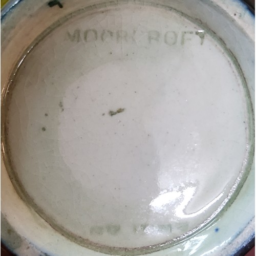 21 - A Moorcroft Pomegranate pattern bottle vase, flared neck,&nbsp; tube lined with fruit and berries, i... 