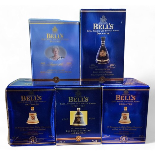 29 - Wines and Spirits - five boxed Bells sealed decanters in the form of bells, Golden Jubilee decanter ... 