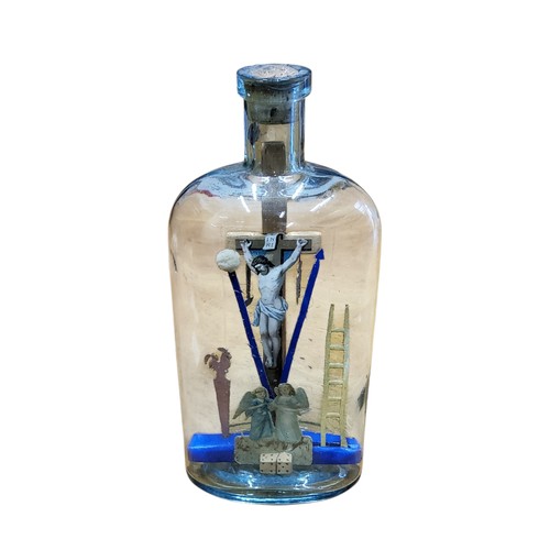 43 - Folk Art - a&nbsp; 19th century softwood and decoupage&nbsp;diorama Crucifixion/Passion bottle, the ... 
