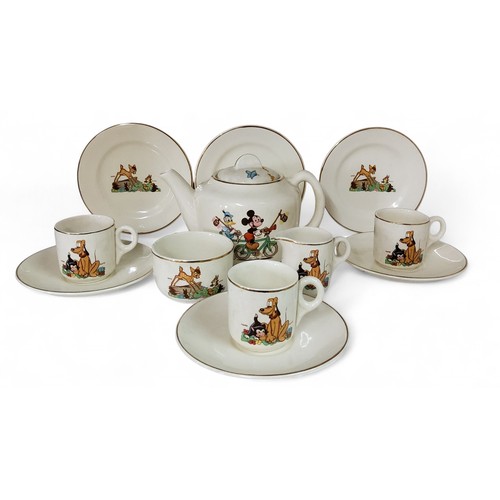 47 - A Beswick Disney nursery tea service, comprising teapot, four cups and saucers, milk jug and sugar b... 