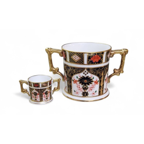 57 - A Royal Crown Derby 1128 pattern two handled loving cup, 7.5cm high, printed mark, first quality;&nb... 