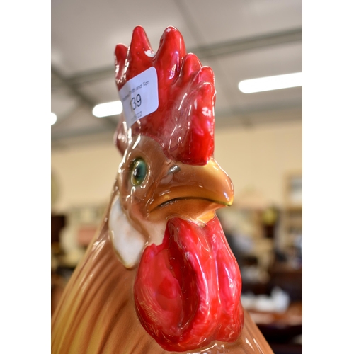 139 - A large Italian glazed pottery cockerel, 51 cm high