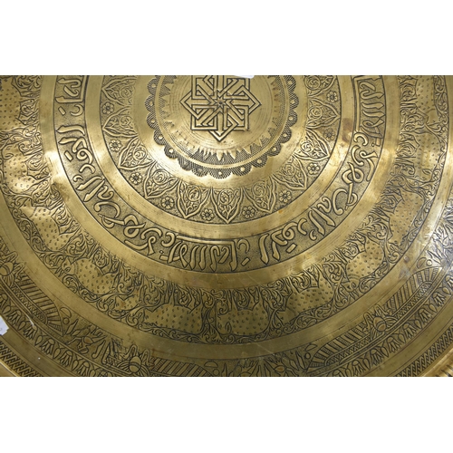 189 - Egyptian brass circular tray with engraved decoration, 58 cm diam