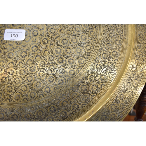 190 - Indian floral-engraved circular brass tray, 53 cm diam