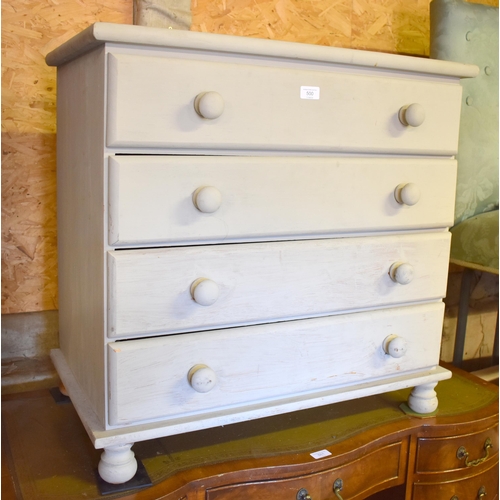 500 - A grey painted chest of 4 long drawers, raised on turned feet, 77 cm w x 46 cm x 74 cm h