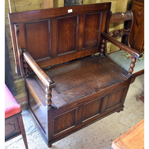 512 - A traditional metamorphic oak monk's box settle/table, 92 cm w x 44 cm x 95 cm h