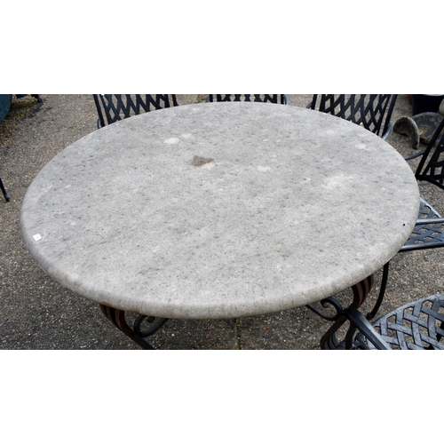 74 - A substantial Regency style circular limestone top on wrought iron base terrace table, 156 cm dia. x... 