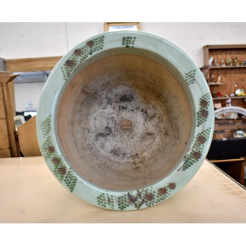 96 - Chinese celadon-glazed jardiniere with floral decoration, 30 cm diam