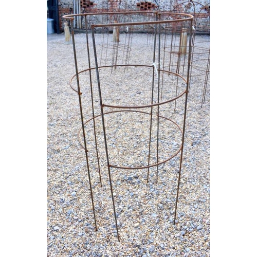 51 - A pair of weathered steel curved garden plant frames, 125 cm h x 60 cm w