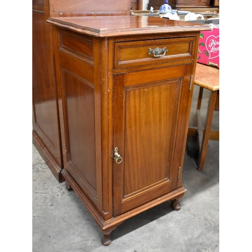 516 - A mahogany stationery cabinet with single drawer over panelled cupboard, on short cabriole supports,... 