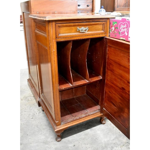 516 - A mahogany stationery cabinet with single drawer over panelled cupboard, on short cabriole supports,... 