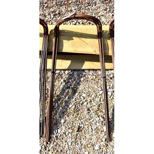 56 - Ten weathered steel curved garden plant frames, approx 90 cm h x 42 cm w