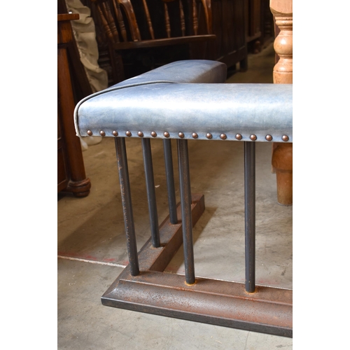 79 - A cast iron club fender with studded blue leather upholstery, 54 cm d (internal 45 cm) x 154 cm w (i... 