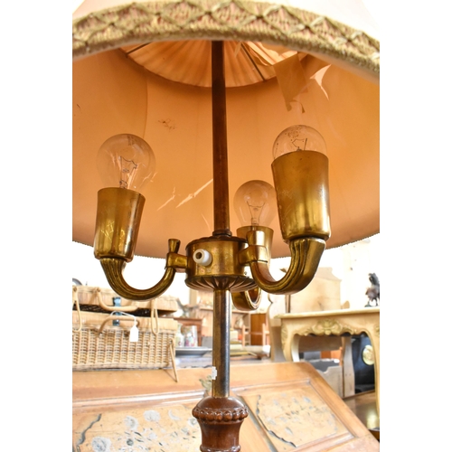 527 - A mahogany and brass three branch standard lamp base on slender fluted column and circular platform ... 