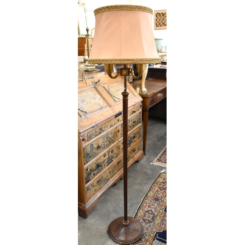 527 - A mahogany and brass three branch standard lamp base on slender fluted column and circular platform ... 