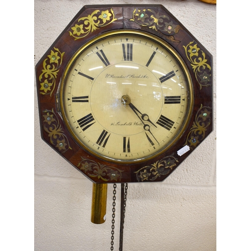 528 - An antique rosewood octagonal wall clock, inlaid with brass and mother of pearl, thirty hour movemen... 