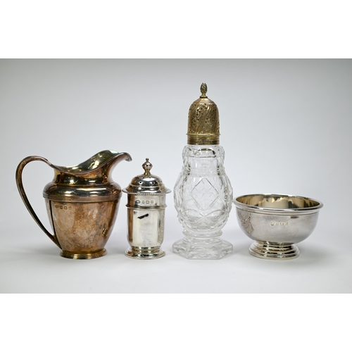 27 - A Victorian silver open salt, cream jug, small stemmed bowl, three napkin rings, open salt with blue... 