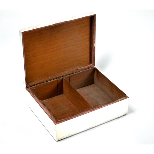 29 - An unmarked white metal cigarette box with cedar lining, the caddy-top engraved with crest, 15cm (te... 