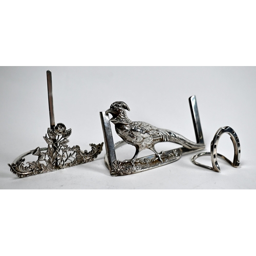 39 - An Edwardian silver menu holder modelled with a golden pheasant, Grey & Co, Birmingham 1907, another... 
