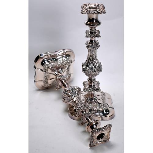 4 - A large pair of silver plated baluster candelabra, the detachable four-branch tops with five sconces... 