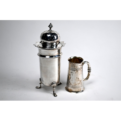 45 - A silver sugar caster on three pad feet, Birmingham 1911, to/w a double-ended tot-measure with scrol... 
