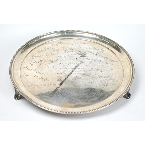 58 - A silver salver with beaded rim, presentation engraving to Geoffrey Treasure, Grove housemaster, Har... 