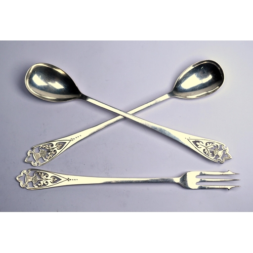 59 - A Scottish silver pickle fork with thistle-pierced finial, to/w a pair of somewhat similar long-hand... 