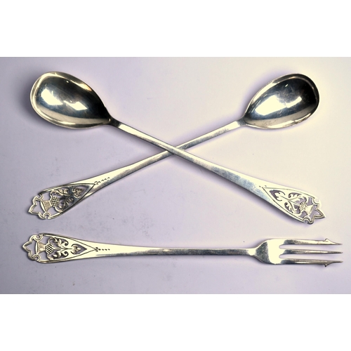 59 - A Scottish silver pickle fork with thistle-pierced finial, to/w a pair of somewhat similar long-hand... 